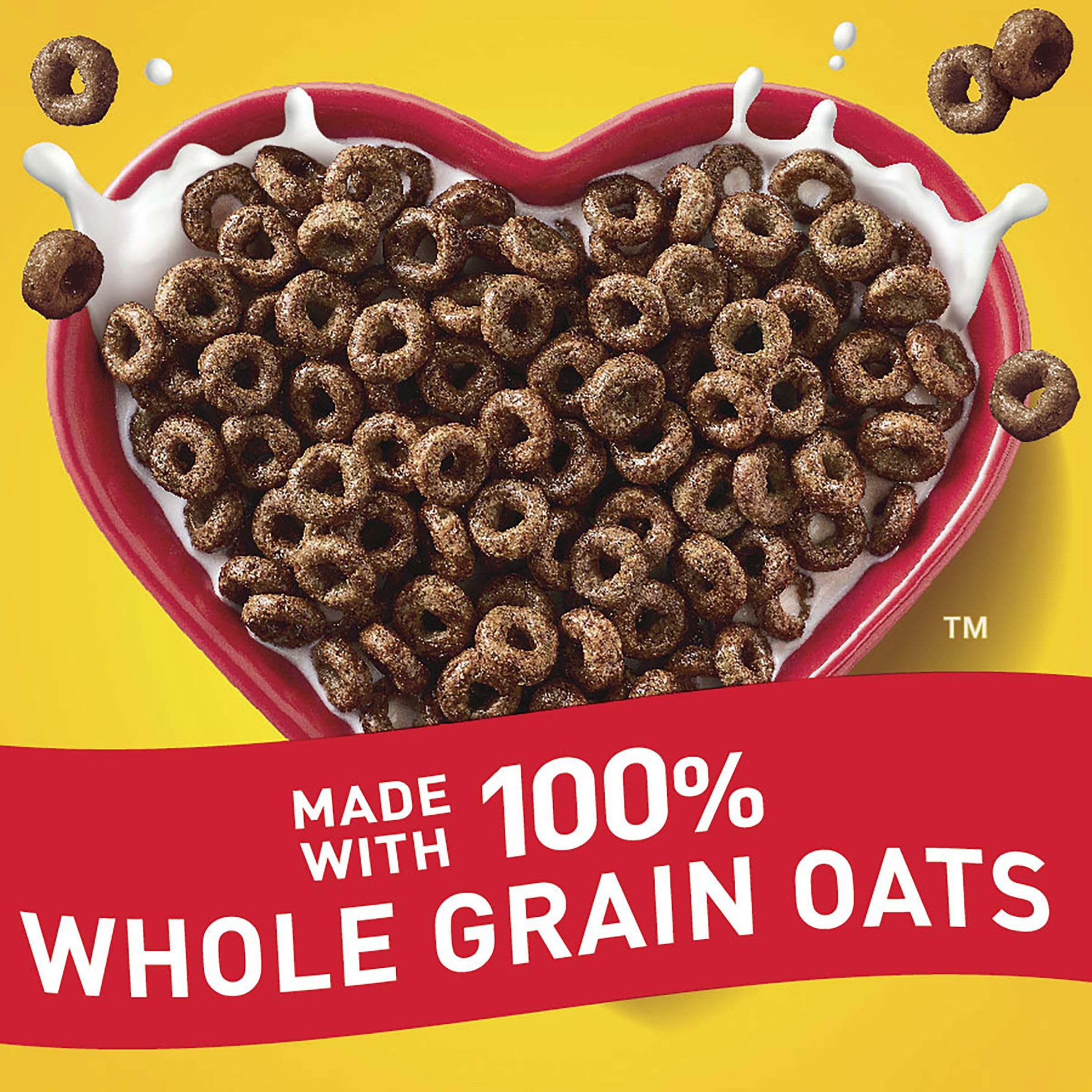 Cheerios Chocolate spoon-tasting a crunchy, chocolatey bite.