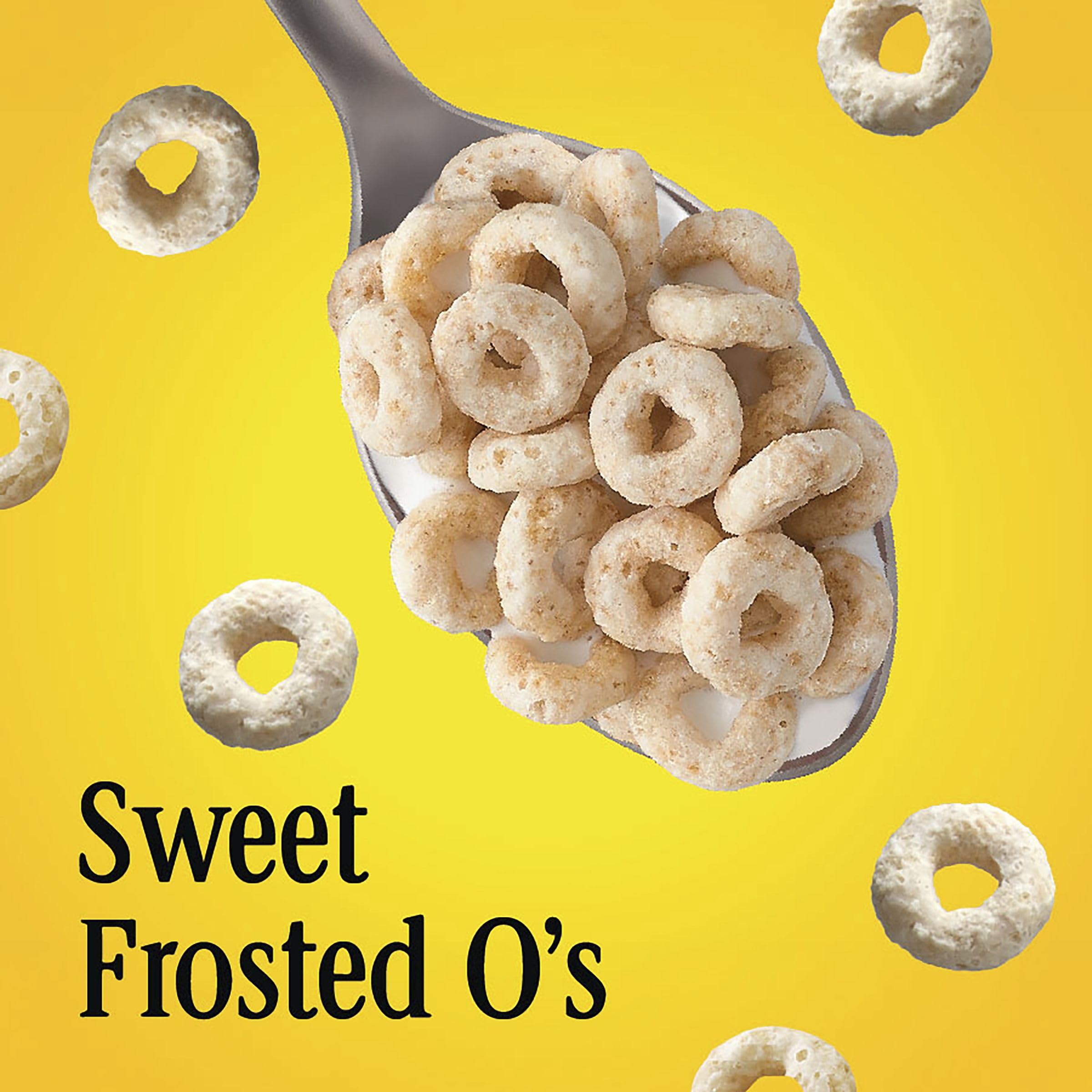 Pouring Cheerios Frosted into a bowl, crisp texture and sweet taste.