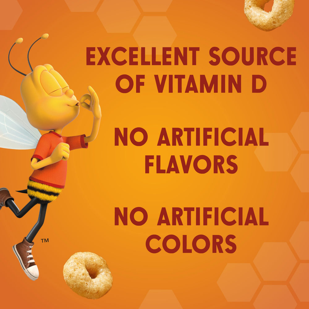 Cheerios Honey Nut cereal cup on-the-go snack tucked in a backpack