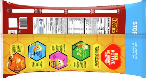 Cheerios Honey Nut cereal box on the kitchen counter highlighting whole grain oats