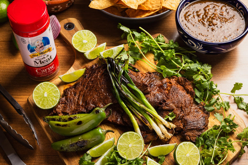 Pouring Chef Merito Carne Asada seasoning over steak
