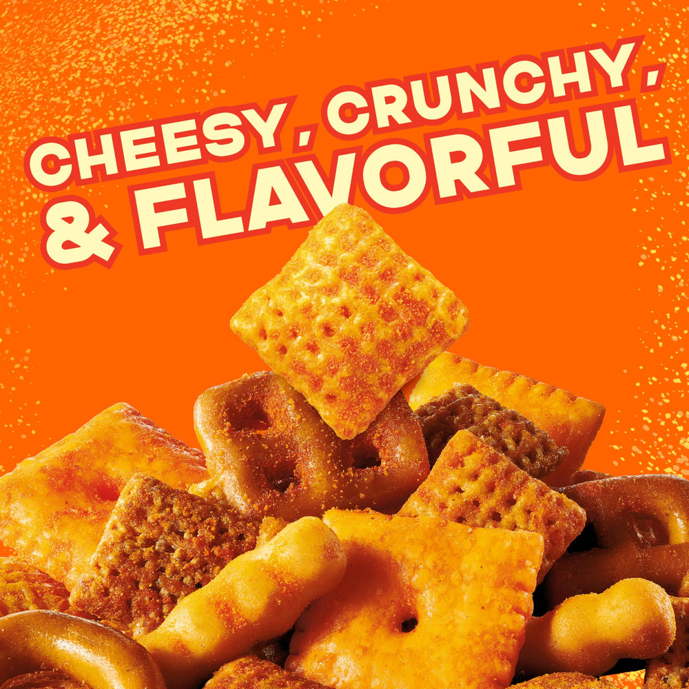 Chex Mix Cheddar Snack crackers and pretzels close-up.