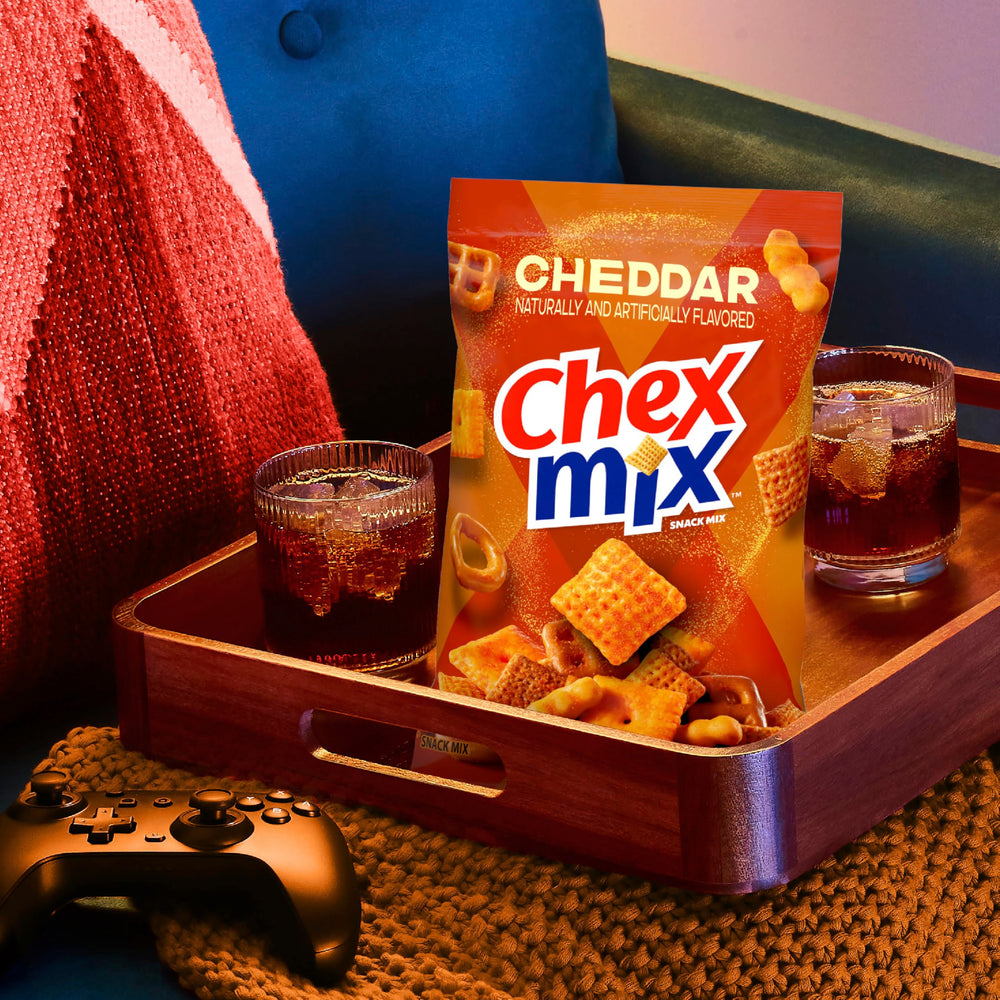 Chex Mix Cheddar Snack serving bowl setup for easy snacking.