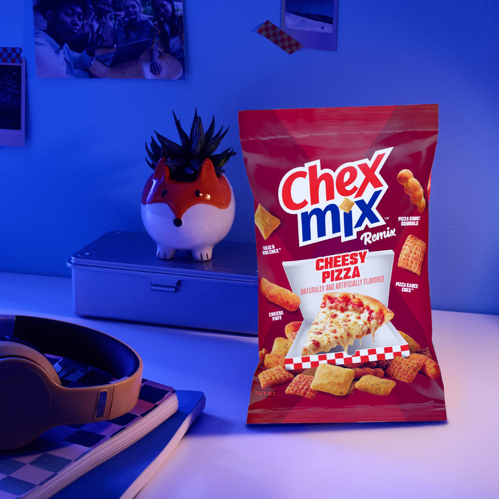 Chex Mix Remix Cheesy Pizza pizza sauce Chex creates zesty, pizza-like notes.