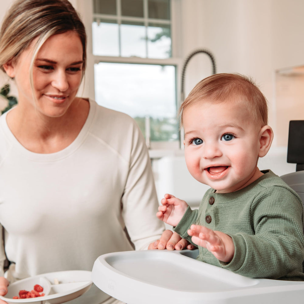 Chicco Bento Booster adjustable harness fitting a growing child securely.