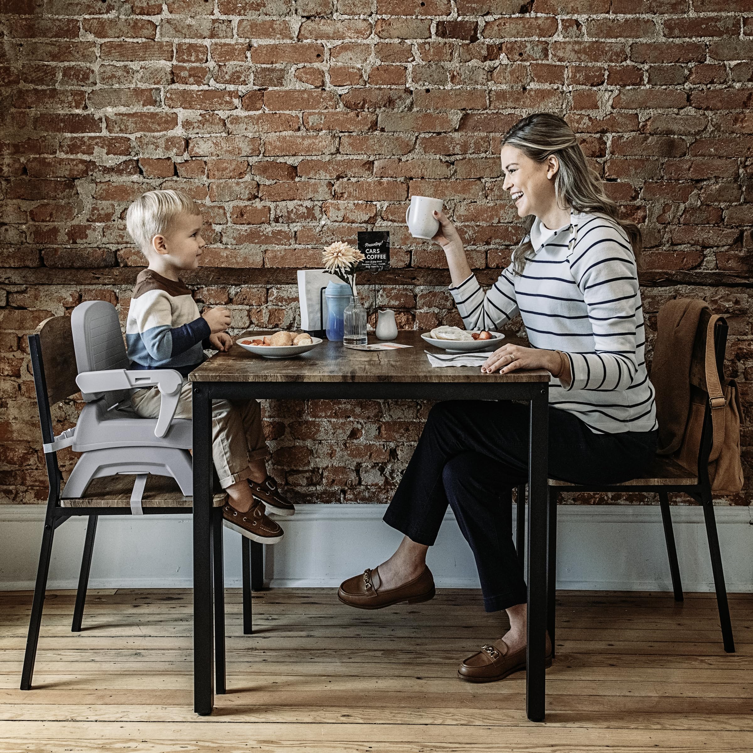 Chicco Bento Booster non-marking feet protecting chair surfaces.