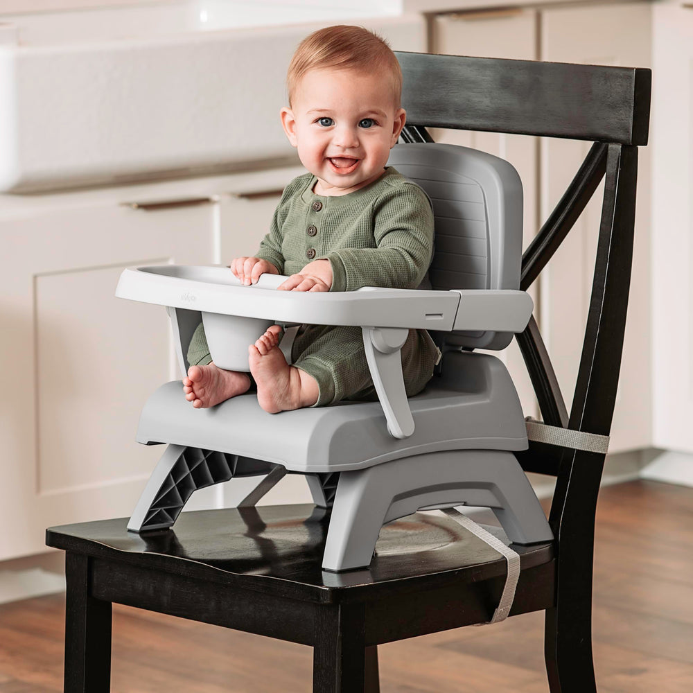 Chicco Bento Booster shows two height positions for growing toddlers.