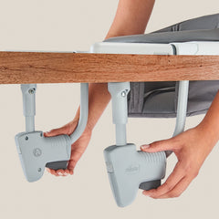 Chicco FastLock high chair rotates to forward, side, and rear feeding positions.