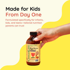 CHILDLIFE ESSENTIALS liquid pour highlights kid-friendly orange mango flavor.