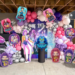 Chinovi K-pop party decor setup featuring Demon Hunters balloons enhances photos.