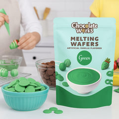 Chocolate Works green melting chocolate wafers ideal for decorating cakes.
