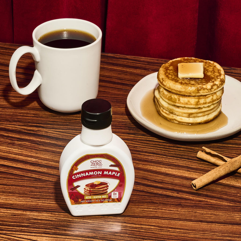 ChocZero Cinnamon Maple Syrup glass jar in pantry, convenient fiber-rich sweetener.
