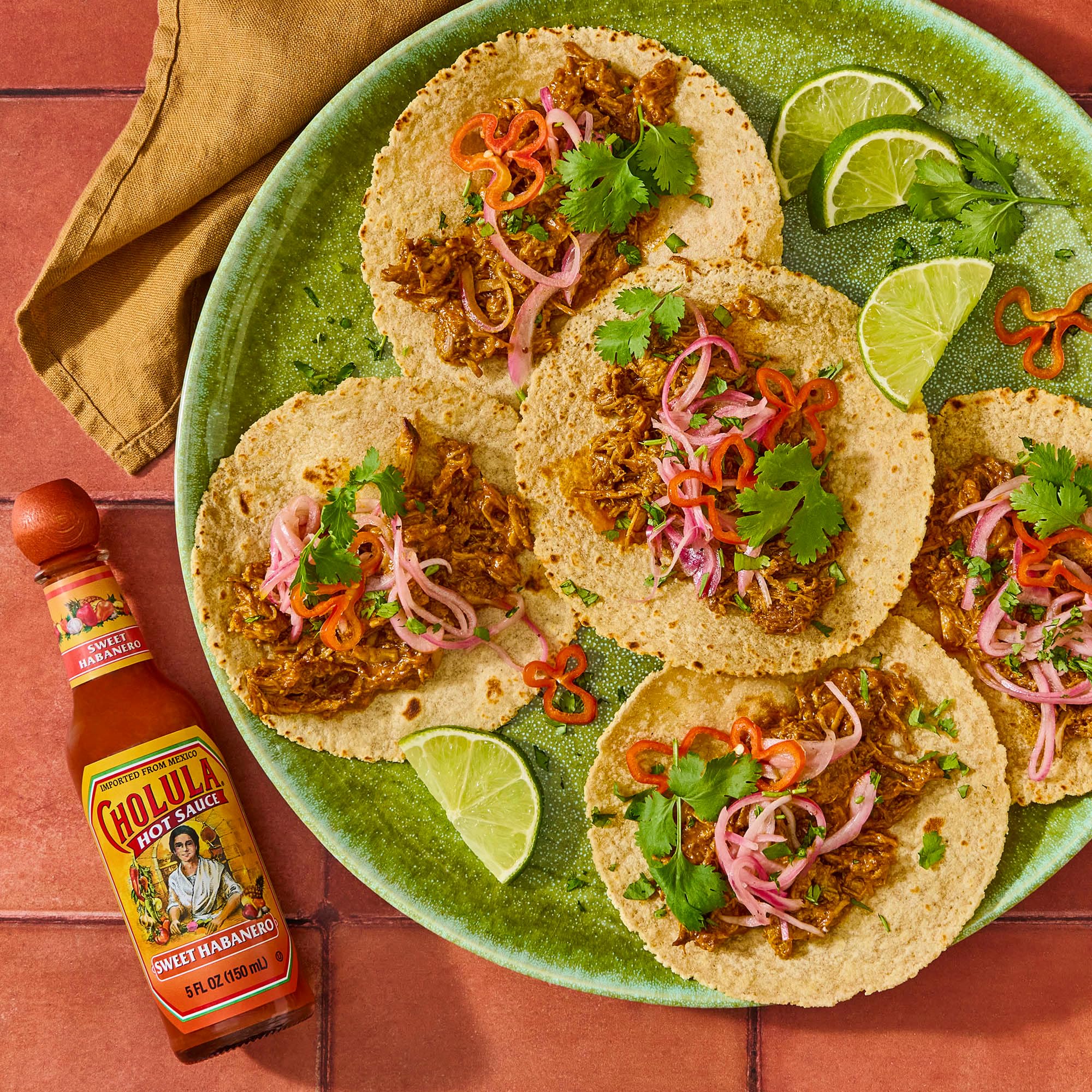 Cholula Sweet Habanero marinades with Caribbean vibe.