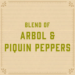 Pouring Cholula Tequila & Lime Reserva adds citrus heat to tacos.