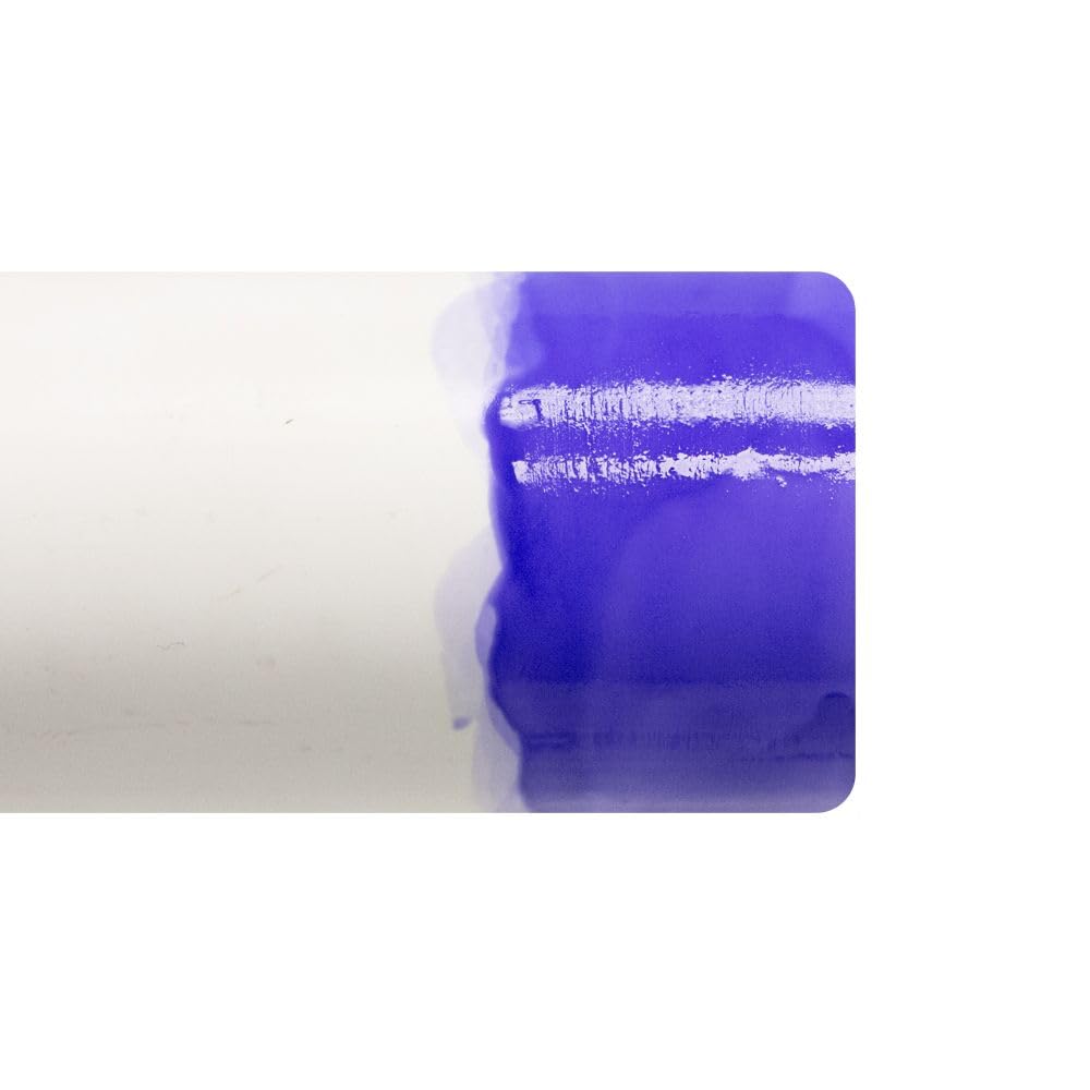 Blue Glue being applied to a PVC pipe for quick joints