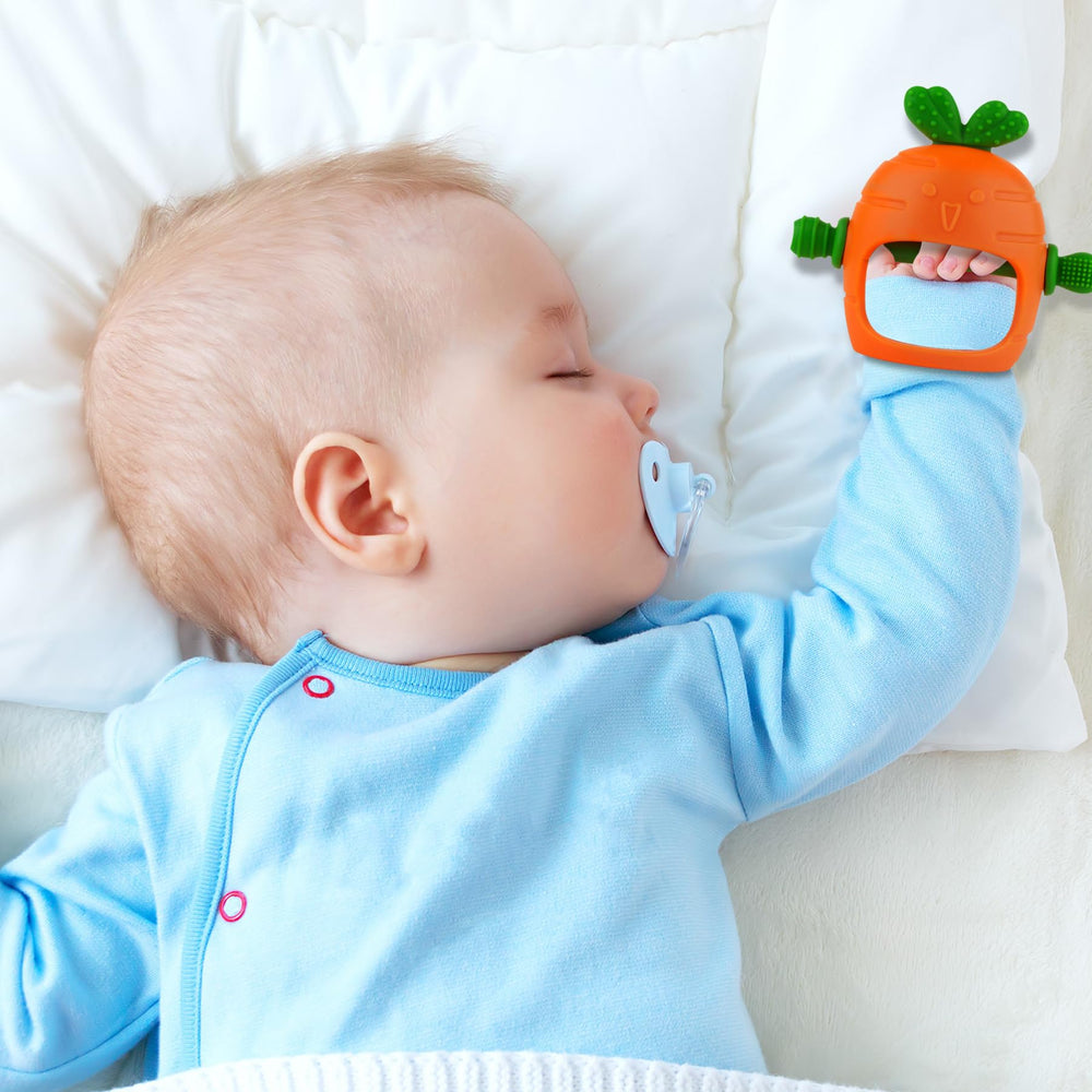 Chuya teether being gripped by a baby demonstrating hand grip