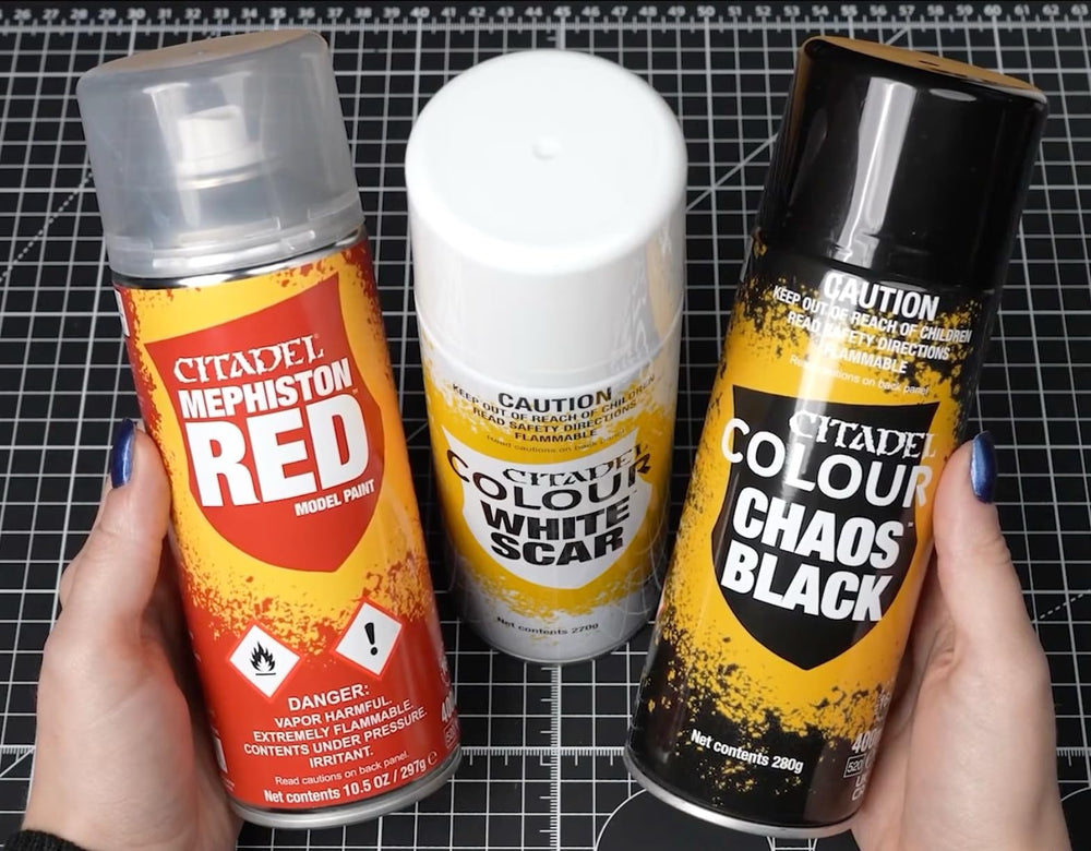 Citadel Chaos Black spray primer angled spray demonstrates consistent matte finish.