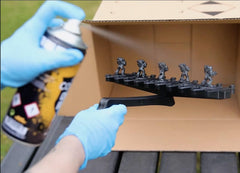 Citadel Chaos Black spray primer close-up shows even base coat on plastics.