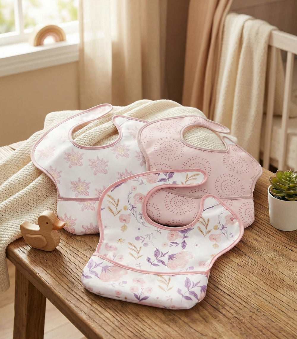 Cheerful pink blossom pattern adds style while protecting clothes.