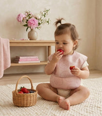 Civarua Kids bibs with reverse pocket design catching spills to protect tables.