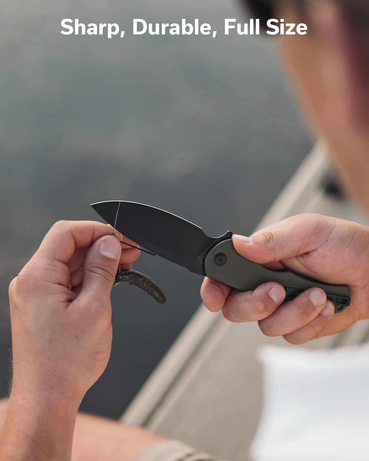 CIVIVI Praxis knife with ergonomic G-10 handle for secure, comfortable grip.