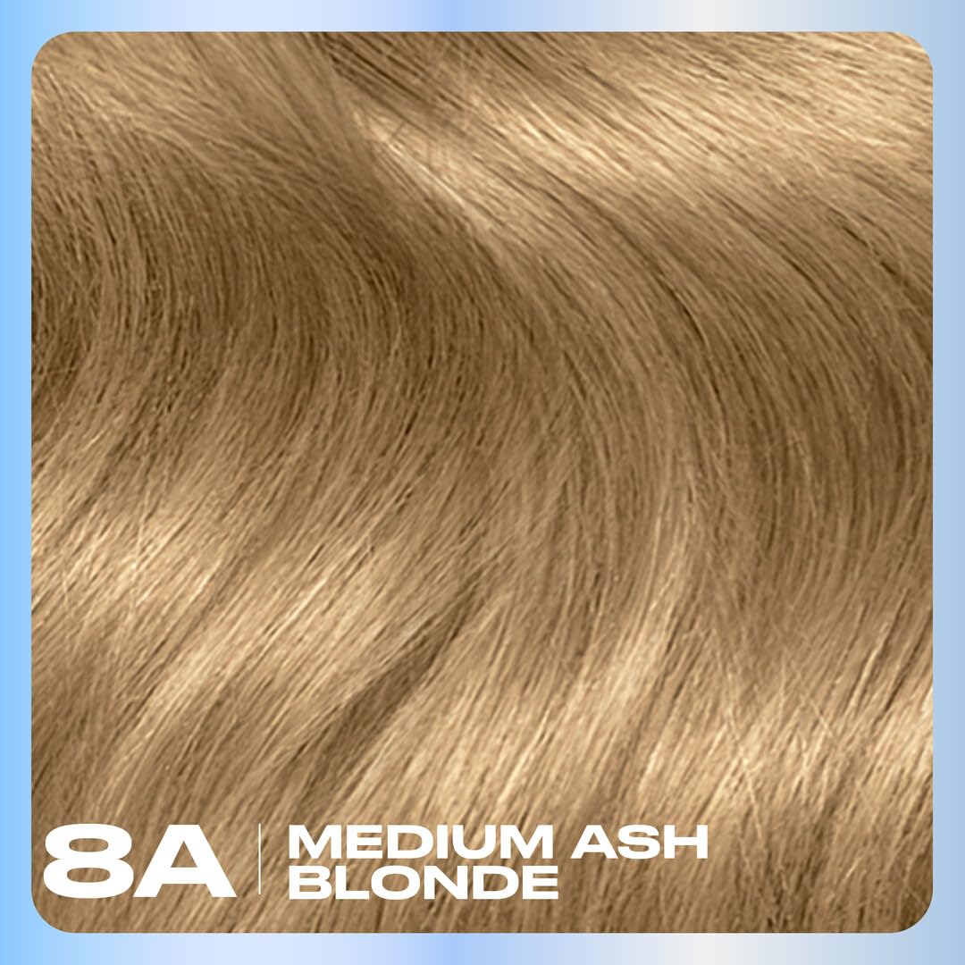 Clairol Nice'n Easy Revitashine Treatment bottle promotes bond strength and color seal.