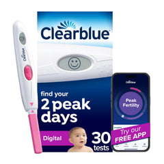 Clearblue digital ovulation reader showing peak fertility with smiley