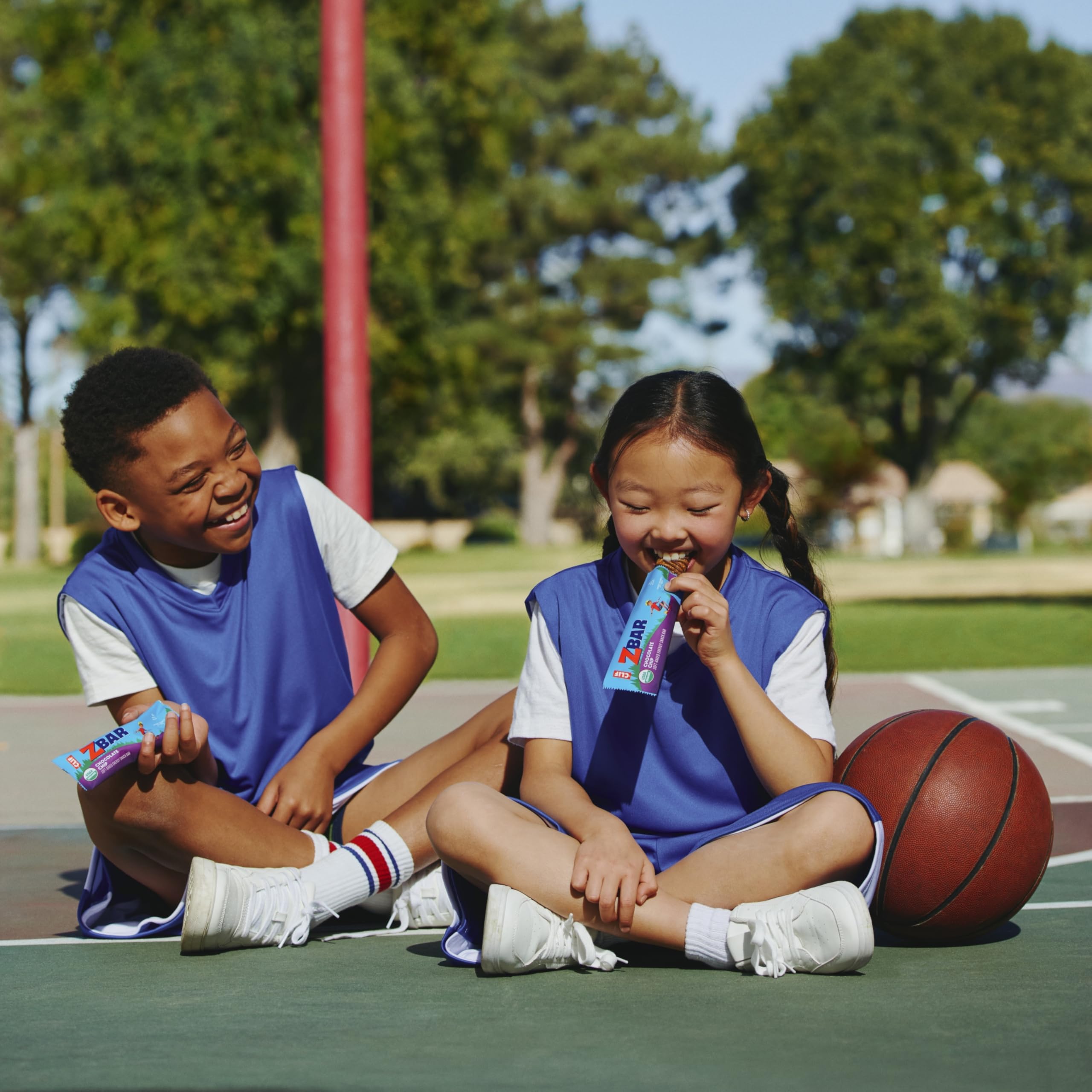 Clif Kid ZBar Chocolate Brownie kids holding image illustrates quick fuel between activities.