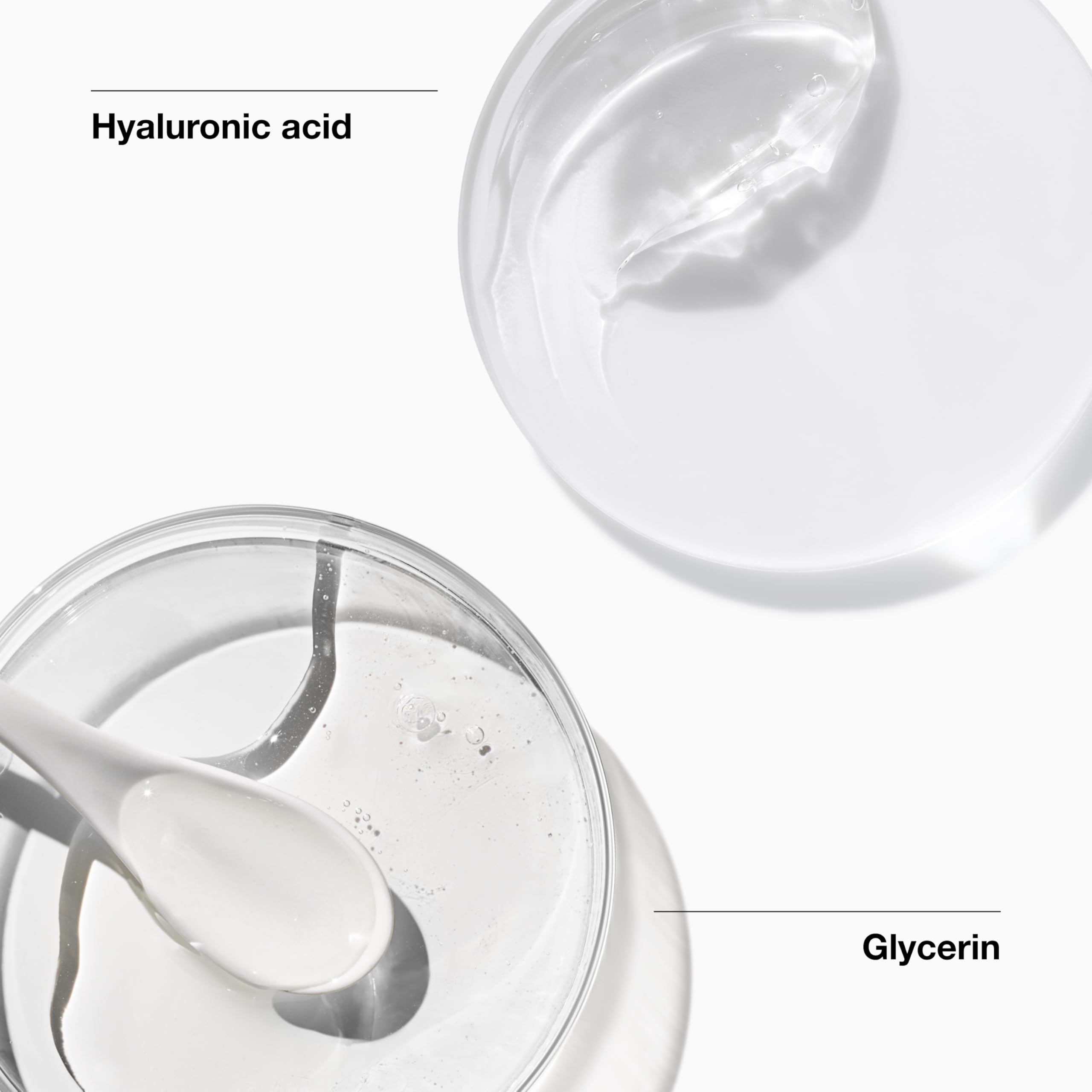 Hands applying Clinique All About Clean foam on the face for cleansing.