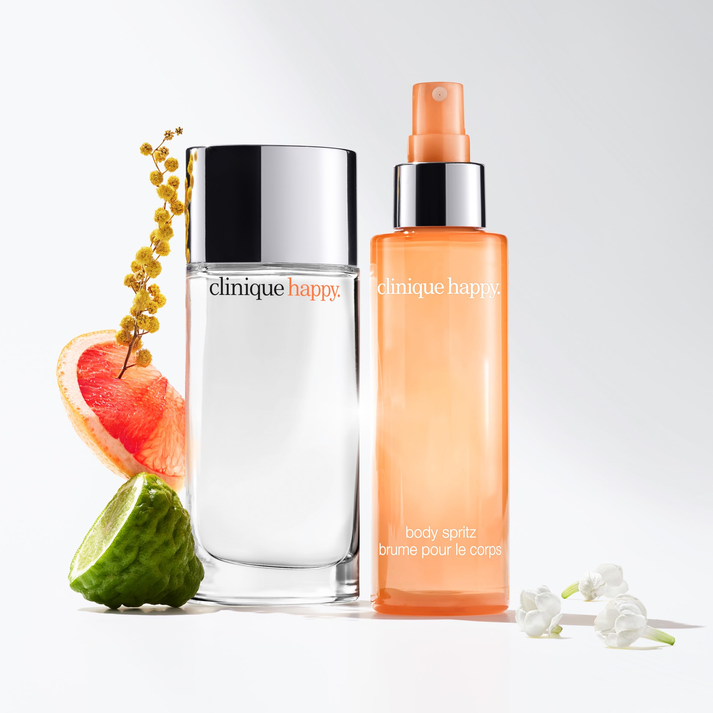 Clinique Happy Body Spritz mist application shown for a quick refresh
