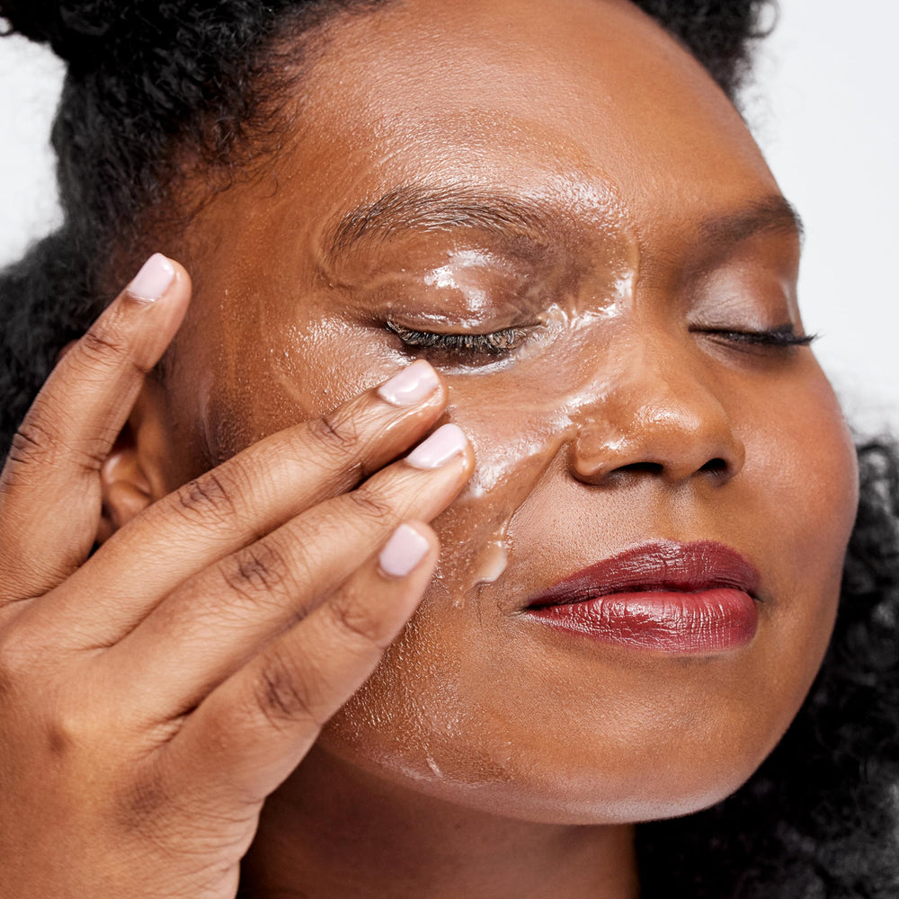 Clinique Take The Day Off packaging closeup highlights fragrance-free, dermatologist-tested formula