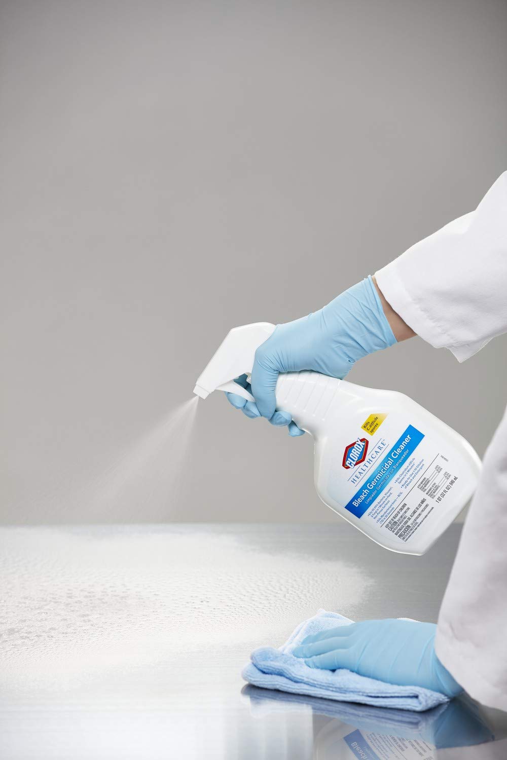 Disinfecting high-touch equipment in a hospital setting.