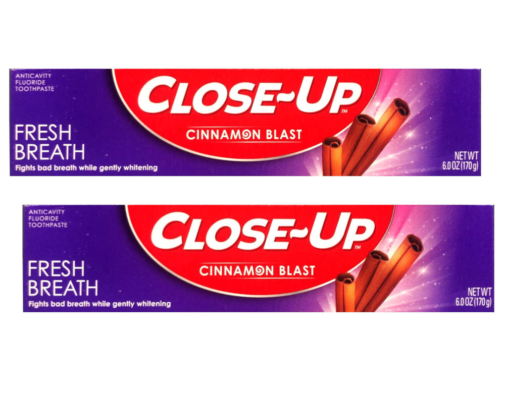 Close Up cinnamon toothpaste bottle showing red gel for fresh breath