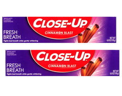Close Up cinnamon toothpaste bottle showing red gel for fresh breath