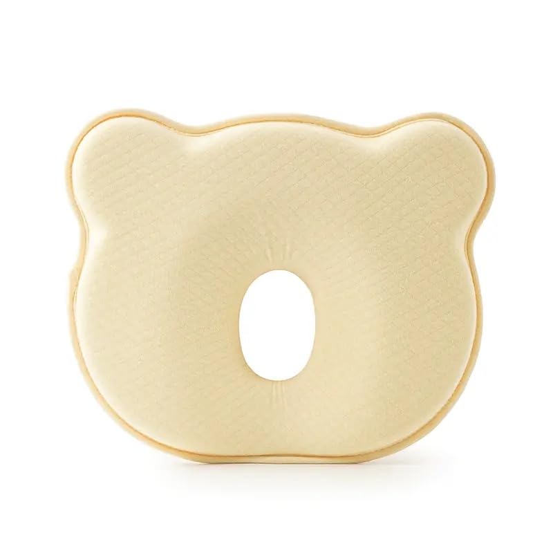 CMJ PRO baby head support cushion in a stroller providing gentle neck support for travel.