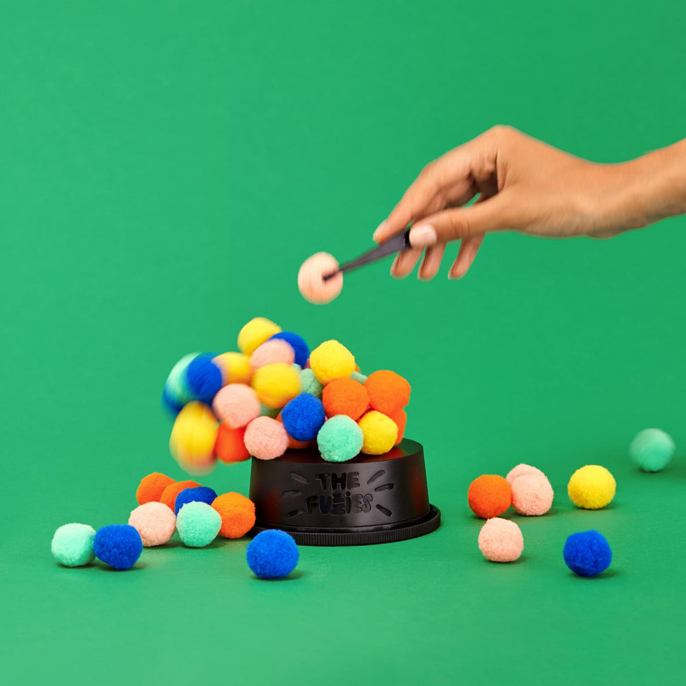 CMYK The Fuzzies: compact, reusable toy for friendly competition.