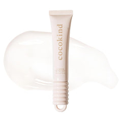 Cocokind Clear Lip Blur Balm bottle with glossy finish for hydrated lips.