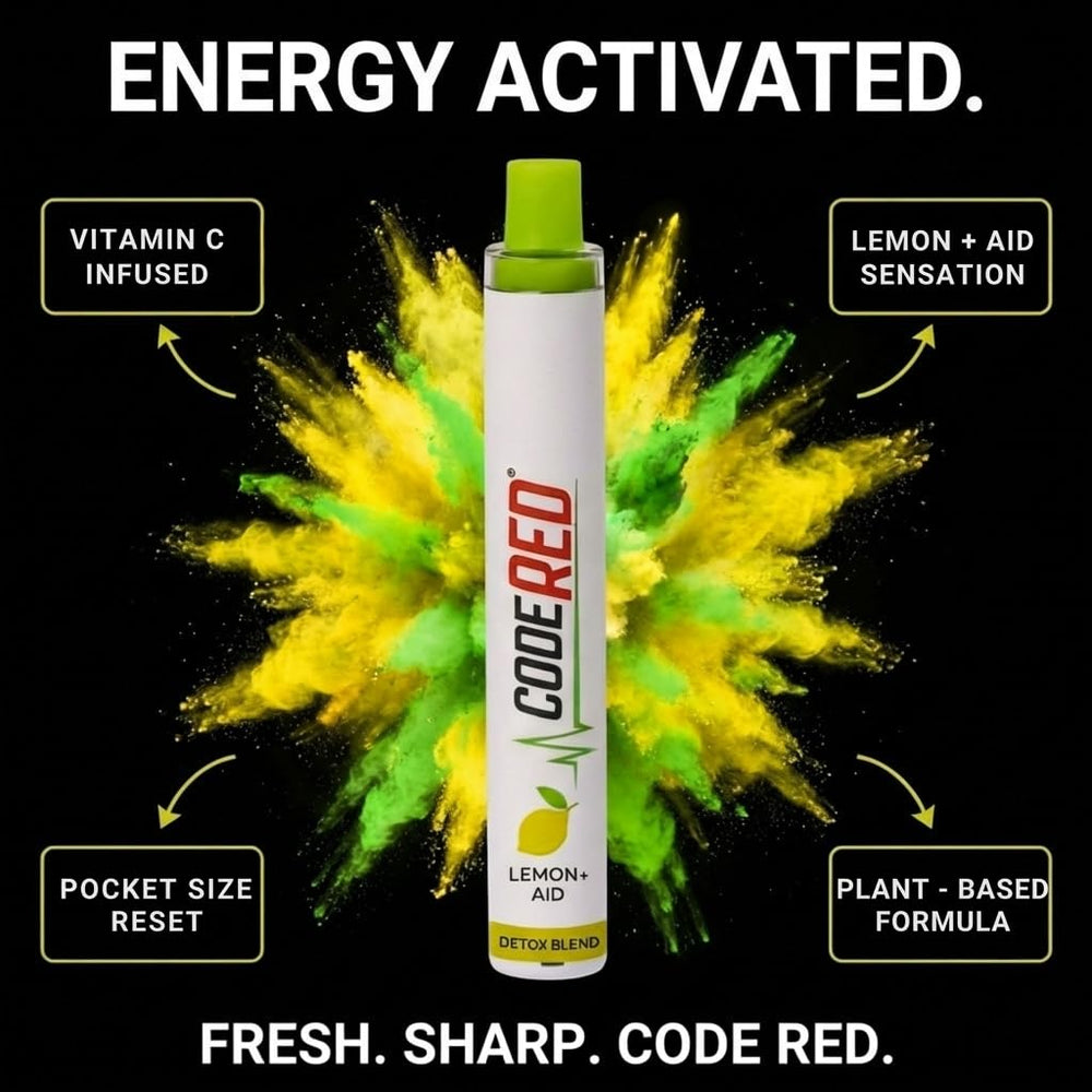 Code Red V-Aid Diffuser Pen on desk in office setup for quick refresh.