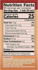 Coffee-mate Vanilla Caramel single-serve packet poured into a cup for smooth office coffee.