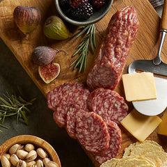 Colameco's Genoa salami paired with cheese and olives for entertaining