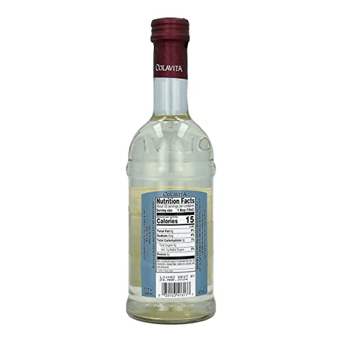 Colavita White Balsamic Vinegar glass bottle highlights an elegant kitchen staple for salads.