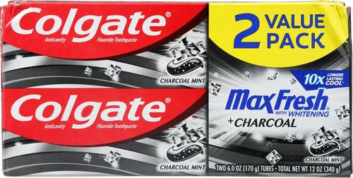 Colgate Max Fresh Charcoal toothpaste tube close-up shows packaging and minty formula