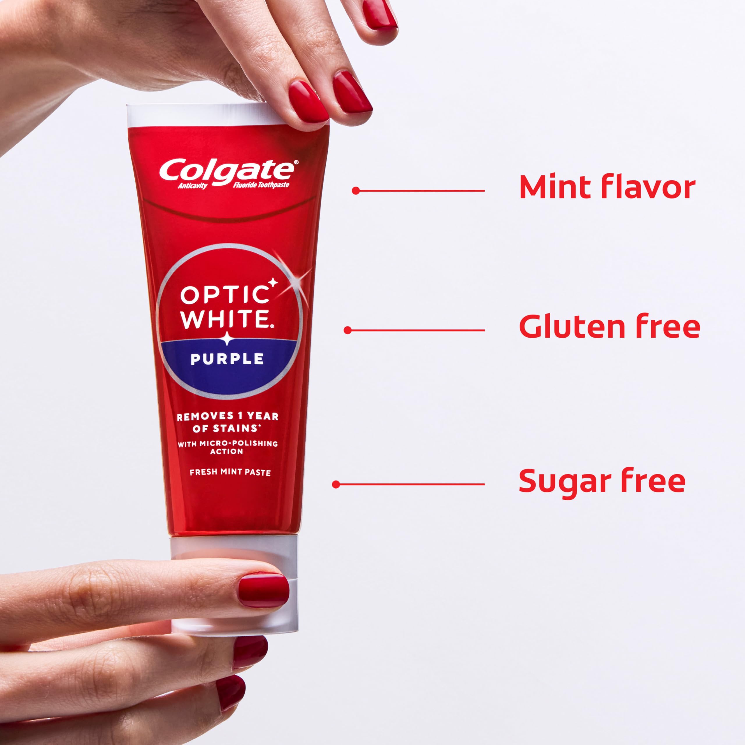 Colgate Optic White Purple tube highlighting fluoride protection against cavities.