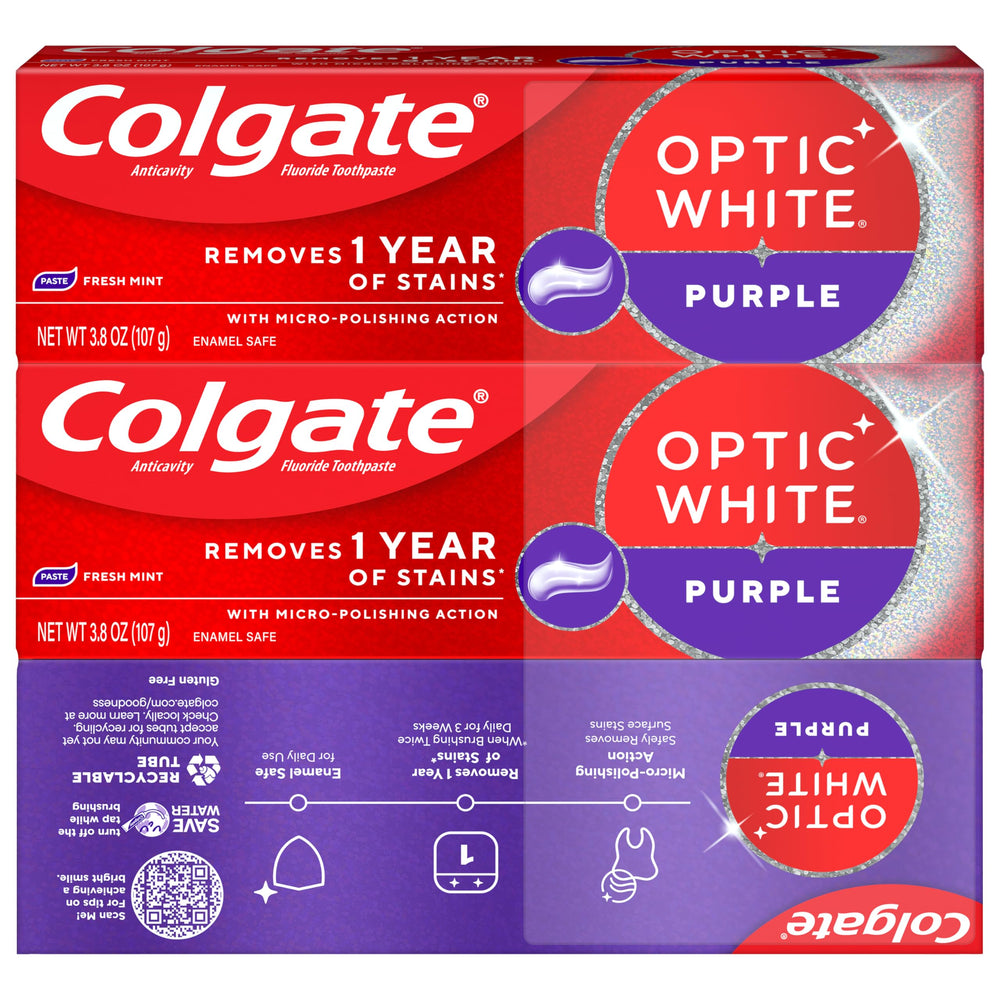 Three-tube Colgate Optic White Purple packaging displayed on shelf.