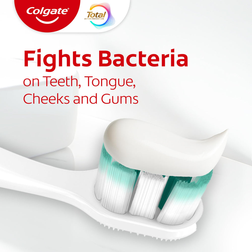 Colgate Total Active Prevention Clean Mint close-up of toothpaste foam texture.