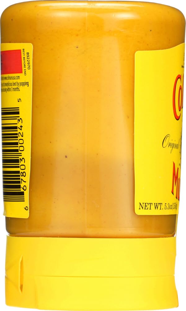Close-up of Colman's mustard texture, smooth and ready to spread.