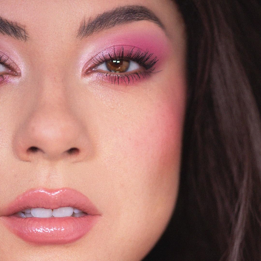 ColourPop Cloud Spun in-hand swatch highlights long-wearing color payoff.