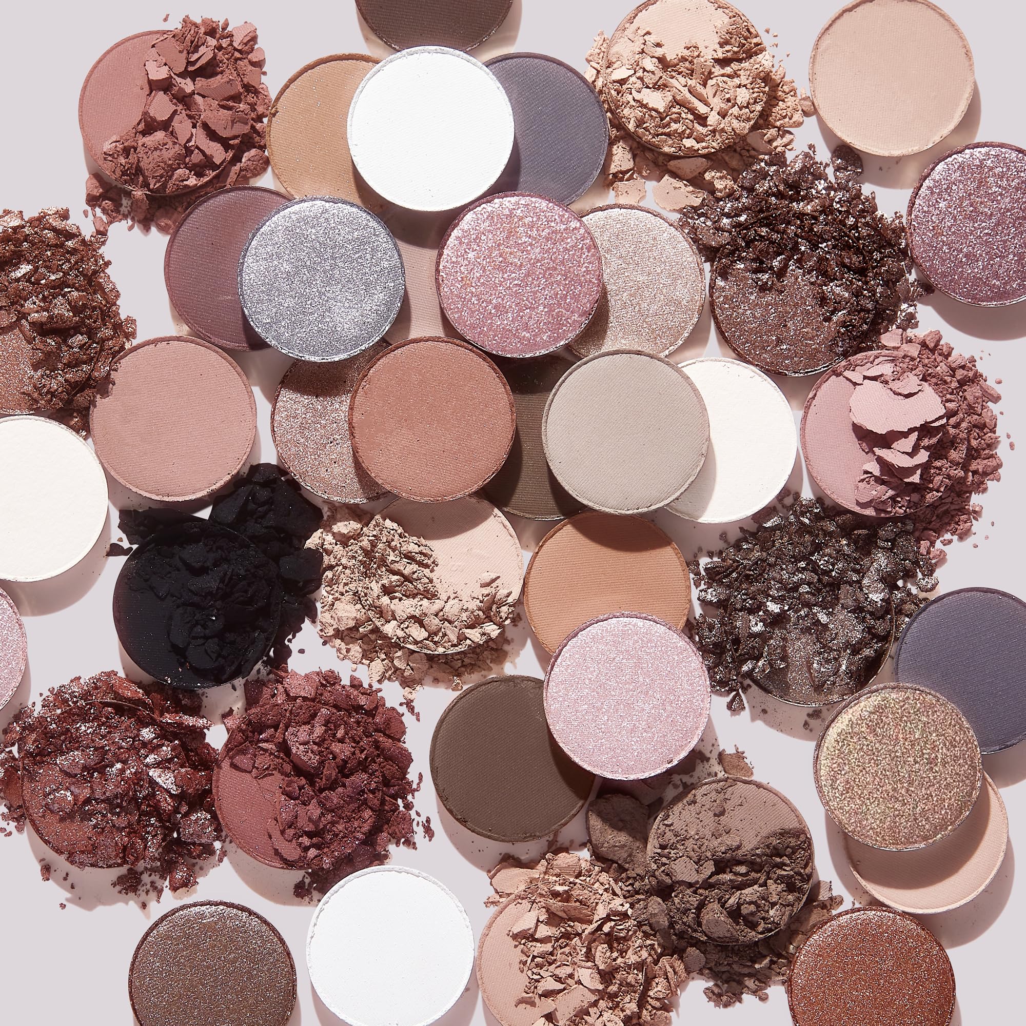 Stone Cold Fox palette pans showing vibrant color payoff in cool tones
