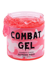 Combat Gel extreme hold bottle close-up with strawberry scent for long-lasting style.
