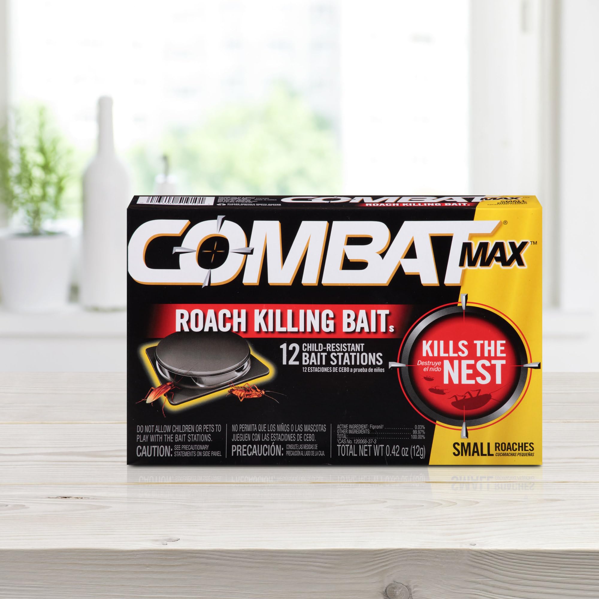 Gel application point on a wall crack with Combat Max Defense System targets hidden roaches.